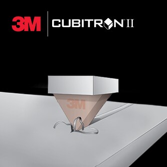 Illustration d'un grain abrasif coupant une surface, avec le logo 3M Cubitron II au-dessus
