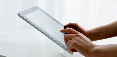 Female using digital tablet
