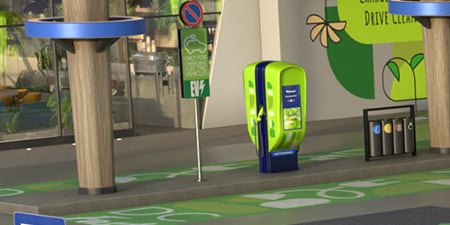 Borne de recharge habillée d'une signalétique verticale.
