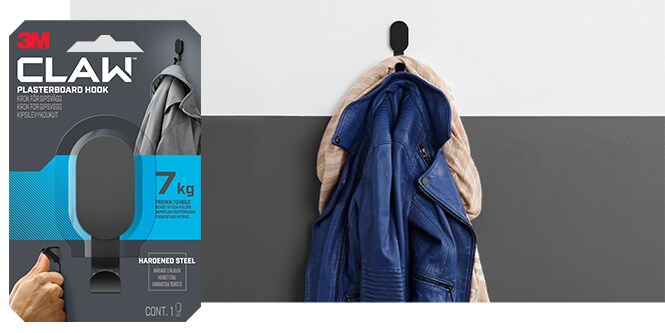 Veste accrochée au mur à l’aide d’un crochet pour plaque de plâtre 3M CLAW™ 7 kg
